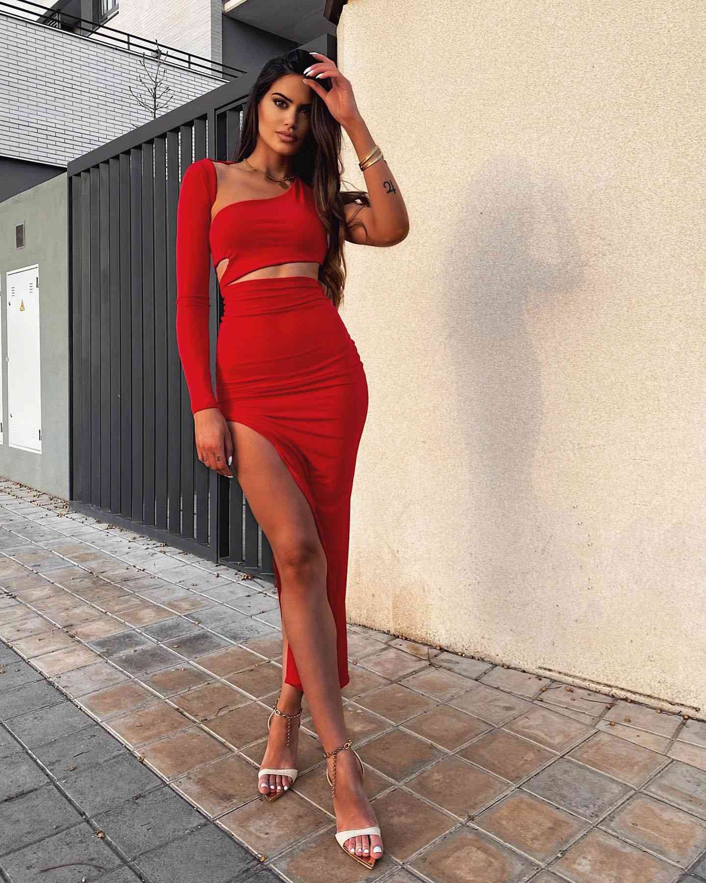 Long assymetrical one sleeve red maxi dress with high slit un red color